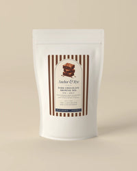 Anchor & Rye Dark Chocolate Brownie Mix, rye and spelt, in a white stand-up pouch with a brown striped label
